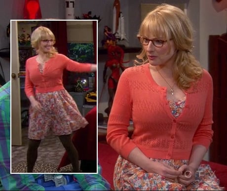 Bernadette’s orange pointelle cardigan over a floral dress and brown tights on The Big Bang Theory