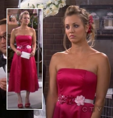 Penny’s pink/red bridesmaid dress with flower belt on The Big Bang Theory