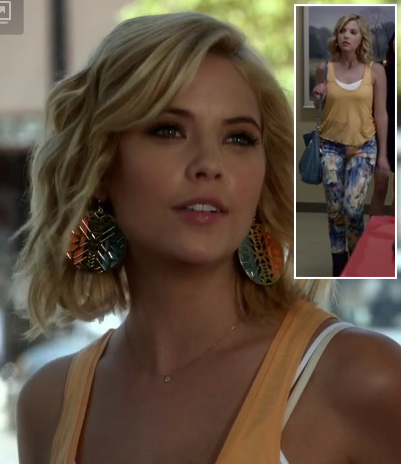 Hanna’s peach tank top, floral jeans and circle earrings on Pretty Little Liars