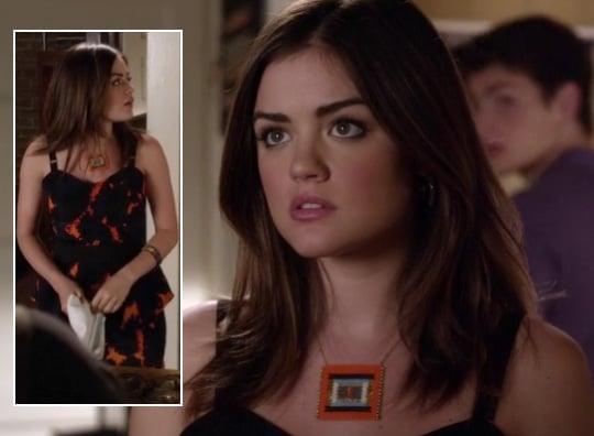 Aria’s navy and orange peplum dress with square necklace on Pretty Little Liars
