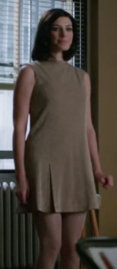 Megan’s beige drop waist dress on Mad Men