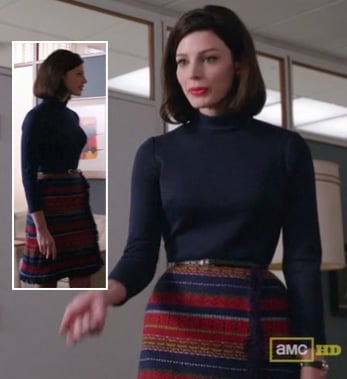 Megan Draper’s striped wrap skirt and navy turtleneck on Mad Men