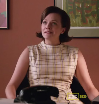 Peggy’s cream plaid dress on Mad Men