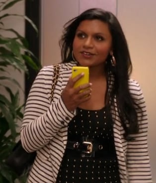 Mindy’s polka dot top, striped cardigan and yellow iphone cover on The Mindy Project
