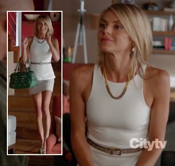 Jane’s green bag and white peplum top on Happy Endings season 3