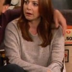 Lily’s beige sweater with elbow patches on How I Met Your Mother