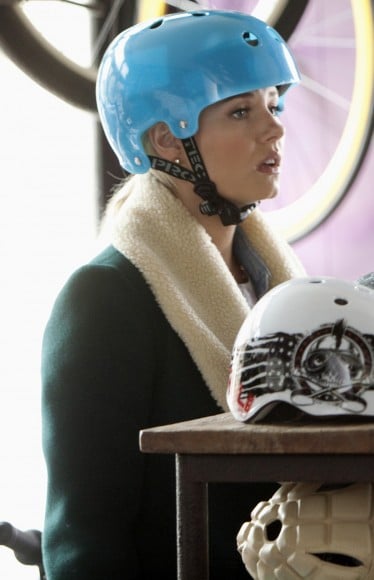 Elisha Cuthberts green shearling coat and blue helment on Happy Endings