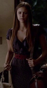 Elena's navy ruffle dress with red belt on The Vampire Diaries