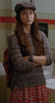 Marley’s red and white patterned skirt and brown striped sweater on Glee
