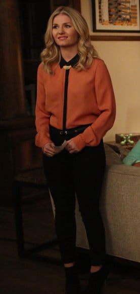 Elisha Cuthbert's orange and black shirt on Happy Endings