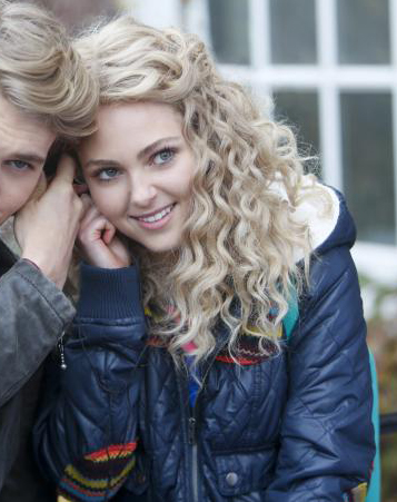 Carrie's blue puffy jacket with rainbow patches on The Carrie Diaries