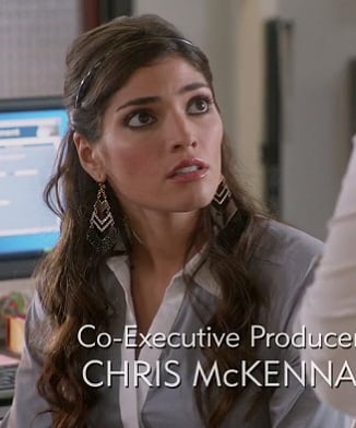 Shauna's grey shirt with white collar on The Mindy Project