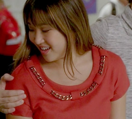 Tina's coral red dress with gold chain on Glee