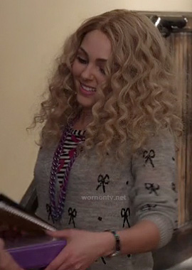Carrie's grey bow sweater with stripes on The Carrie Diaries