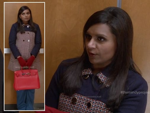 Mindy's navy and red coat with red purse on The Mindy Project