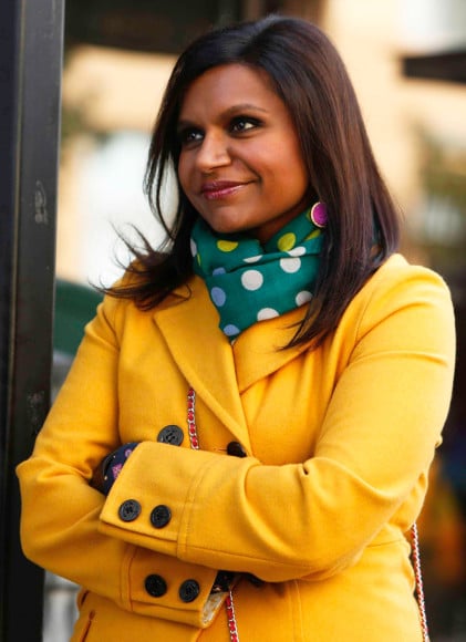 Mindy's yellow coat and green polka dot scarf on The Mindy Project