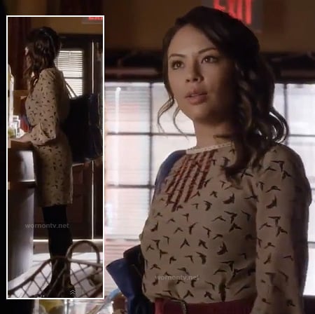 Mona's brown bird dress with red detail on PLL