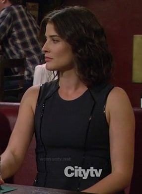 Robin’s black dress with leather piping on How I Met Your Mother