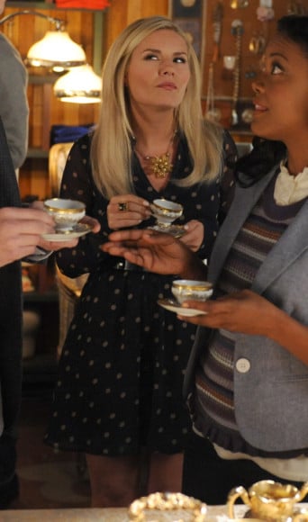 Alex's polka dot dress and gold flower necklace on Happy Endings