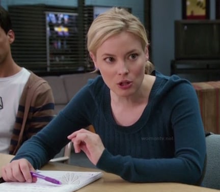 Britta’s teal blue sweater with elbow patches on Community