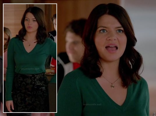 Penny's green v-neck sweater and black/silver printed skirt on Happy Endings