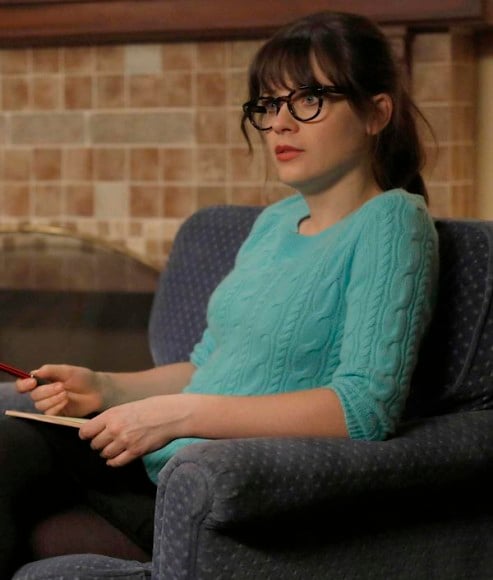 Mint green cable knit sweater worn by Zooey on New Girl