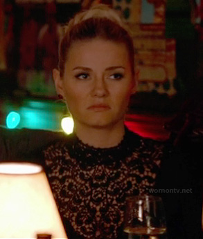 Alex’s black lace turtleneck top on Happy Endings
