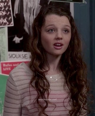 Dorrit's striped sweater and star necklace on the Carrie Diaries