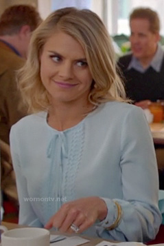 Jane's sky blue tie front top with long sleeves on Happy Endings