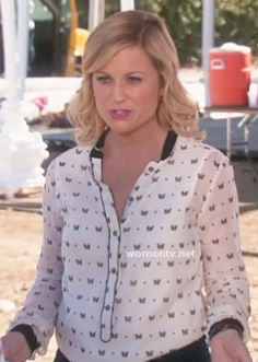 Leslie’s white butterfly print top on Parks & Rec