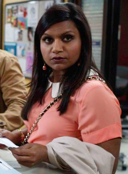 Mindy's peach top with white collar on The Mindy Project