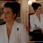 Penny’s white blazer with black contrast details on Happy Endings