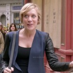 Christina (Chloe Sevigny)’s navy blazer with leather sleeves on The Mindy Project