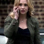 Caroline’s army green peplum jacket and navy/green lace top on The Vampire Diaries