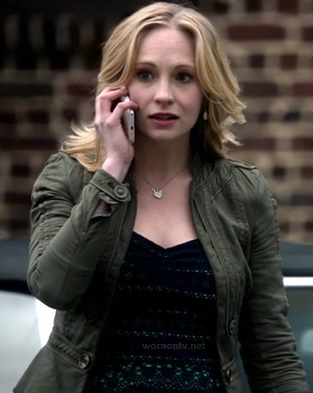 Caroline’s army green peplum jacket and navy/green lace top on The Vampire Diaries