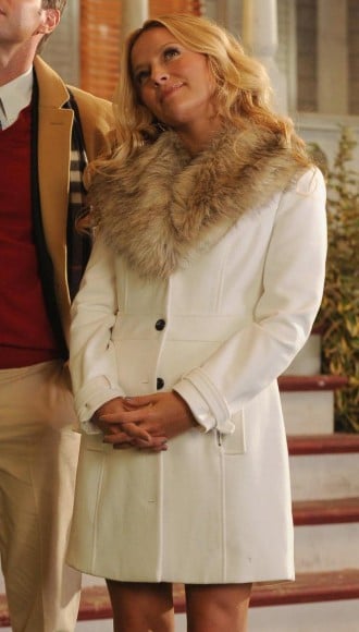 Chloe's white fur collar coat on The Goodwin Games