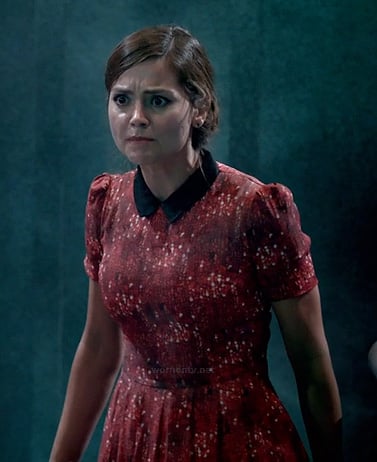Clara’s red printed dress with black collar on Doctor Who