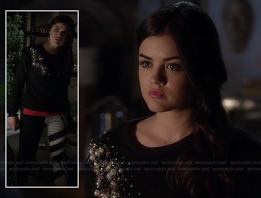 Aria's black and white geo stripe jeans on PLL