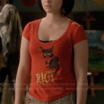 Bay’s orange cat “riot” tee and patchwork jeans on Switched at Birth