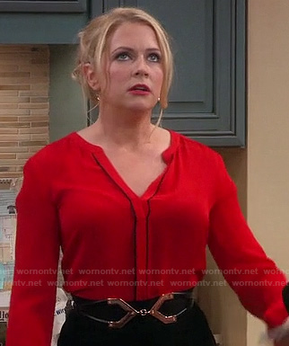 Mel’s red blouse with black piping on Melissa and Joey