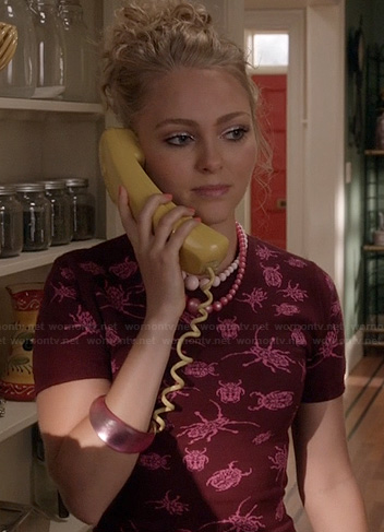 Carrie's pink and red bug print dress on The Carrie Diaries