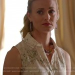 Paige’s white sleeveless shirt with green print on Royal Pains