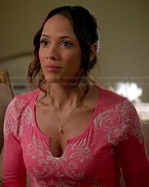Rosie’s pink and white printed split neck tee on Devious Maids