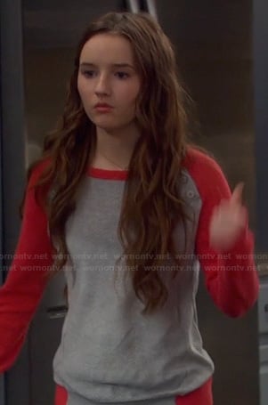 Eve’s red and grey shoulder button baseball sweater on Last Man Standing