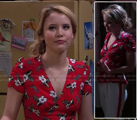 Lennox's red floral v-neck top with ruched sleeves on Melissa  & Joey