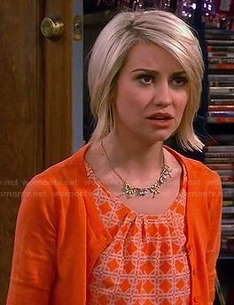 Riley’s orange geometric print top on Baby Daddy