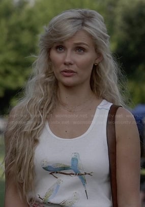 Scarlett’s white budgie graphic tank top on Nashville
