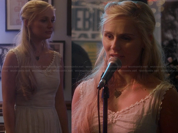 Scarlett’s white cotton flower trim dress on Nashville