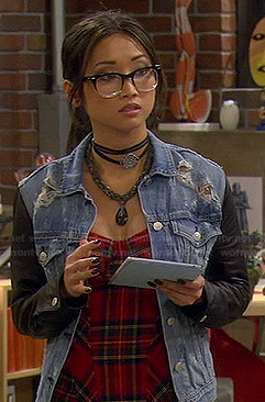 Veronica’s plaid bustier top and denim jacket with leather sleeves on Dads