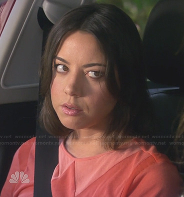 April’s orange top with faux collar on Parks and Recreation